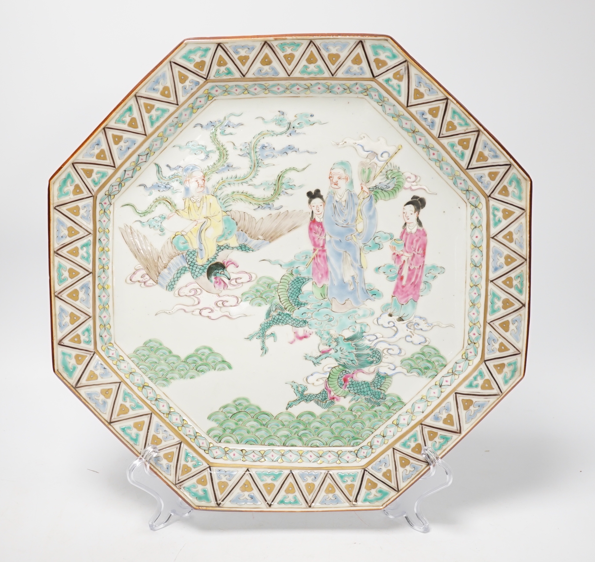 A Japanese porcelain octagonal dish enamelled with figures, dragon and bird, Meiji period, 36cm high